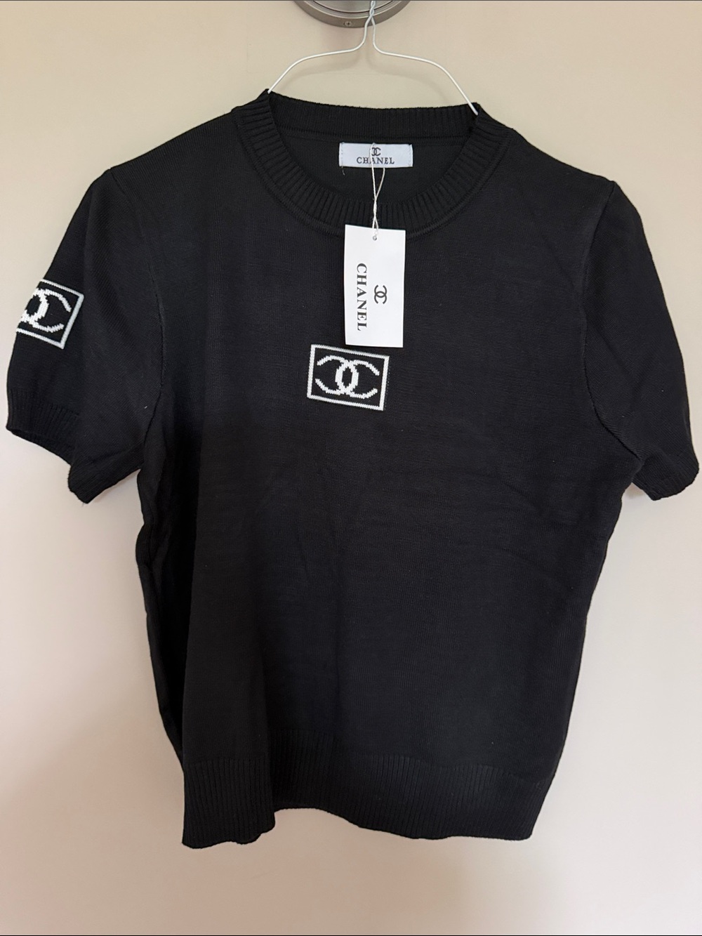 CHANEL Black Crewneck Short-Sleeve Knit Sweater with White CC Patch M/L
